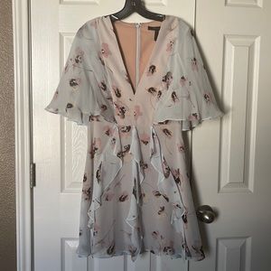 Light blue floral dress with back zipper and flowy sleeves